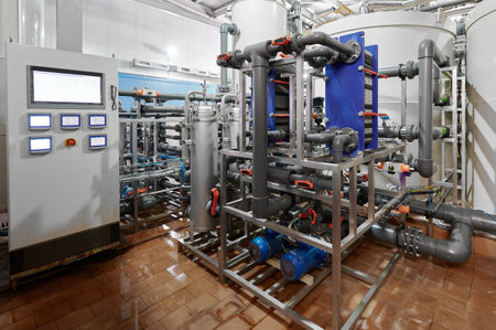 Detailed view of chemical plant pipelines and valves highlighting industrial processes in a working...