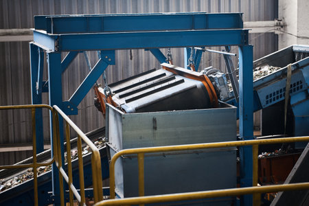Conveyor magnetic separator for extracting metal from the stream of household wasteの写真素材