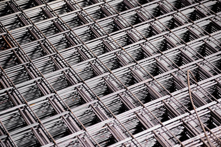 Stacked welded wire mesh in cold plant storehouse macro view