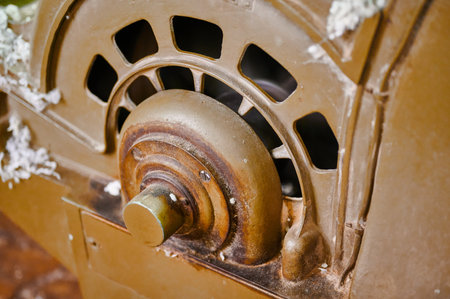 Fragments of vintage textile machines showcase intricate designs and craftsmanship from a bygone era, inviting exploration of industrial historyの写真素材