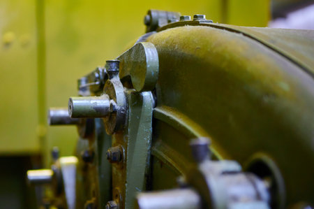 Intricate details of vintage textile machinery showcasing craftsmanship and engineering ingenuity in an industrial settingの写真素材