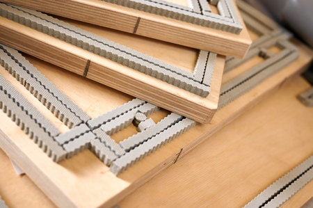 Innovative cardboard box manufacturing process featuring precision die cutting dies for intricate...