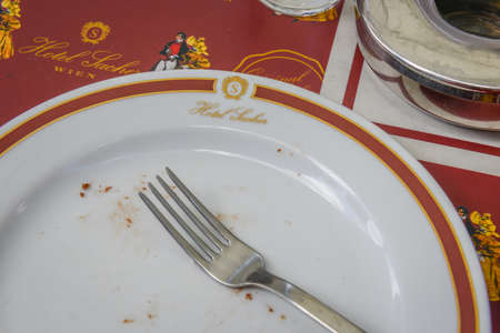 VIENNA, AUSTRIA - JUNE 01. 2016: Original Sacher Torte with cream and fork at Sacher Cafe, Vienna, Austria, Europe june 01, 2016のeditorial素材