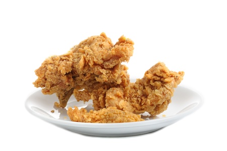 front view of fired chicken on plate with focus stacking technic isolate on white backgroundの写真素材