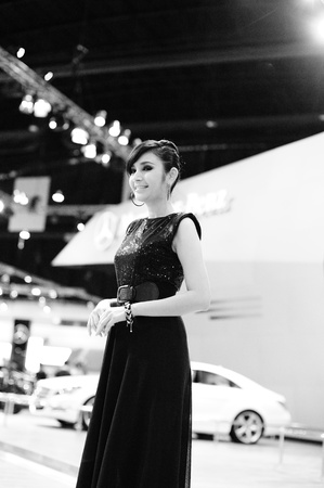 NONTHABURI, THAILAND - MARCH 26: Unidentified female presenter at Mercedes Benz booth  in the 32nd Bangkok International Motor Show on March 26, 2011 in Nonthaburi, Thailand.のeditorial素材