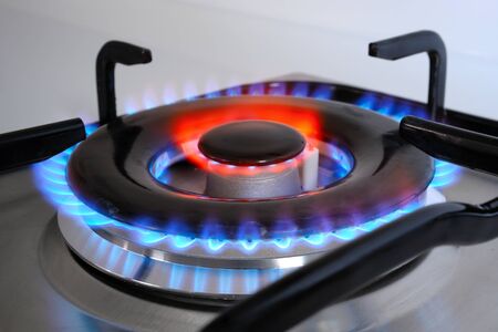 gas burning from a kitchen gas stoveの写真素材