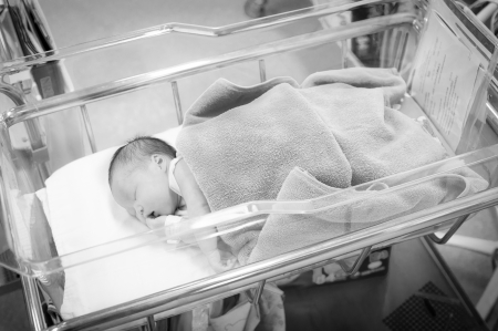 New born baby girl sleeping at hospitalのeditorial素材
