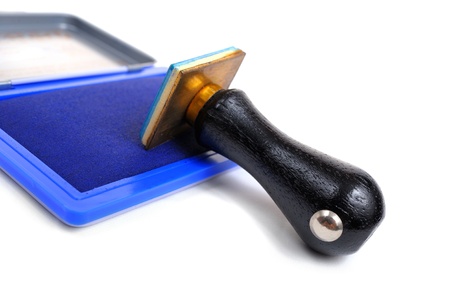 closeup stamp and stamp pad on white backgroundの写真素材