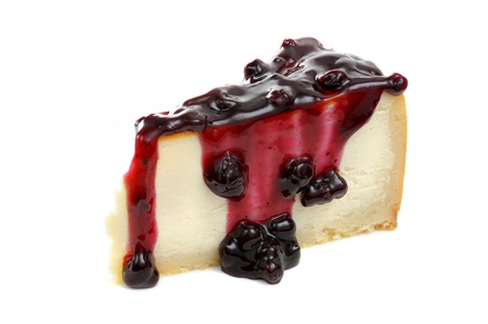 new york cheese cake with blueberry jam on top isolated on white backgroundの写真素材