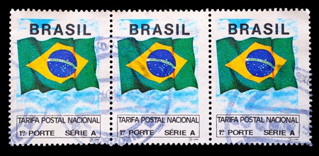 THAILAND - CIRCA 1991: A used postage stamp printed in Brasil showing the flag of Brasil, circa 1991.のeditorial素材