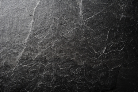 dark grey-black stone textureの写真素材