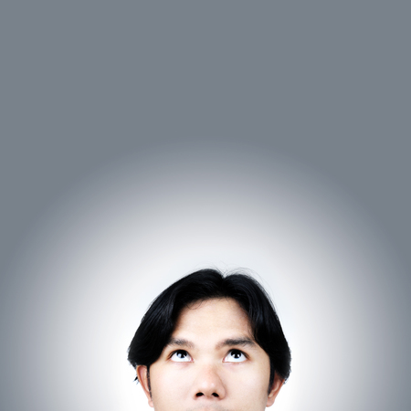 young asian man have an ideaの写真素材