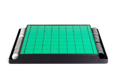closeup green Reversi board (Othello) with discs