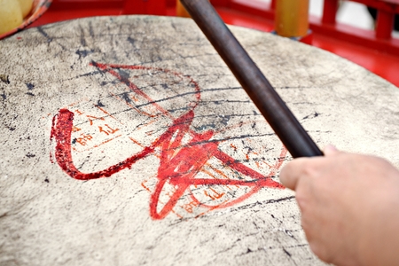 CHONBURI, THAILAND - OCTOBER 04: Closeup mystic symbol of drum in Nine Emperor Gods Festival parade on October 04, 2013 in Chonburi, Thailand. This Festival is also known as "Vegetarian Festival" or "Je".のeditorial素材