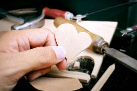 the man made heart shape from plank