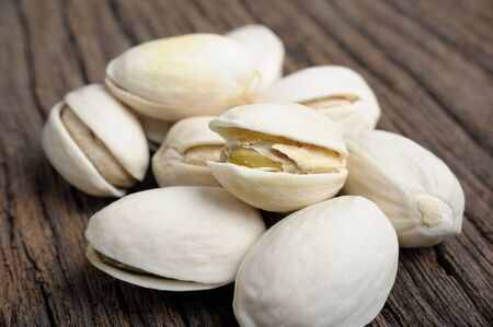 closeup roasted and cracked pistachios
