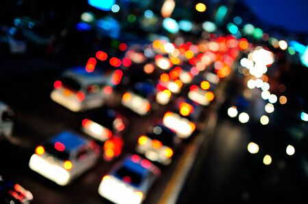 abstract out of focus of evening traffic.の写真素材