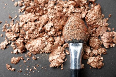 closeup brushes with colorful cosmeticsの写真素材