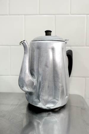 classic kettle for isolated on stainless steel deskの写真素材