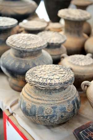 vintage containers used to put holy things in and keep in underground hiding placeの写真素材