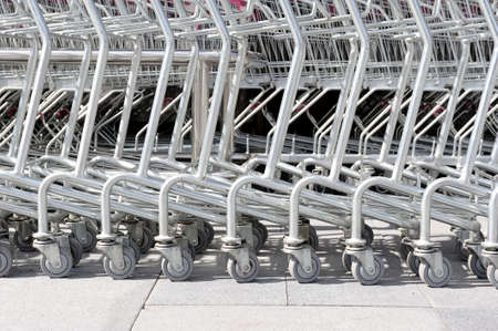 abstract roller of shopping cart at parking lot