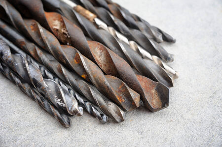 Drill bits on concrete backgroundの写真素材