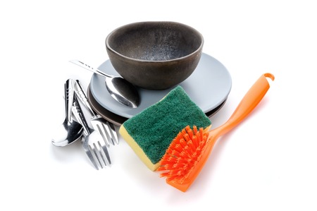 dishes and equipment for cleaning on white backgroundの写真素材