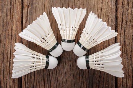 closeup shuttlecocks isolated on wooden tableの写真素材
