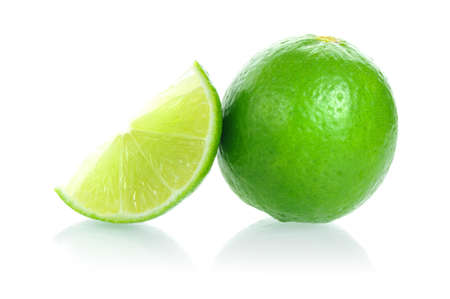 fresh green limes isolated on white background