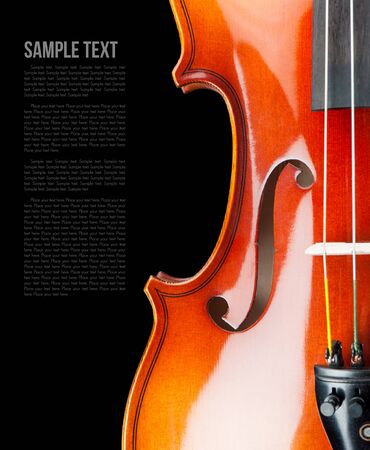 closeup new classical violin on black backgroundの写真素材