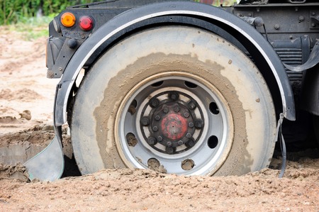 truck mired deeply in the mud