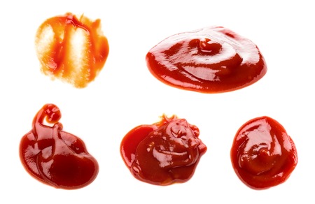 closeup detail of ketchup isolated on white backgroundの写真素材
