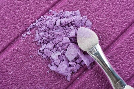 closeup purple cosmetics on purple backgroundの写真素材
