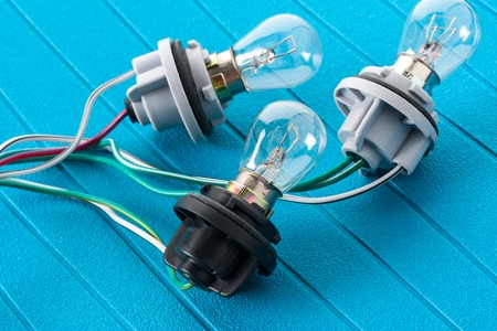 automotive light bulb connected to light socketの写真素材