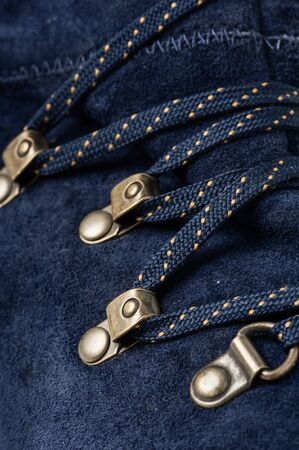 closeup detail of blue suede shoes