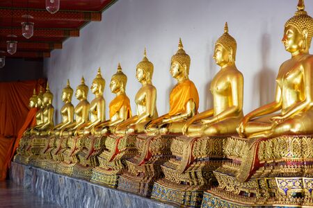 BANGKOK, THAILAND - FEBRUARY 19, 2015: Golden buddha images at Wat Pho (Wat Phra Chetupon Vimolmangklararm) in Bangkok, Thailand.のeditorial素材