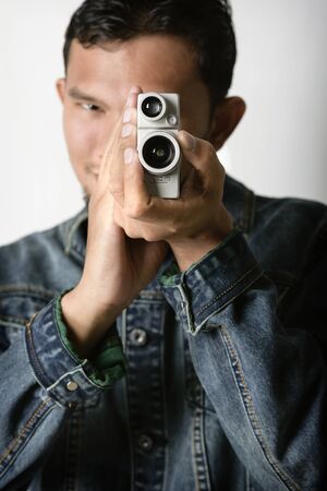 old vintage VDO camera in hand