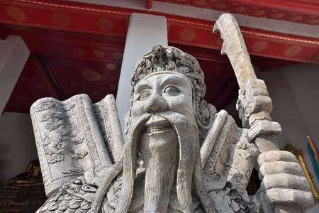 BANGKOK, THAILAND - FEBRUARY 19, 2015: Statue of chinese man at Wat Pho in Bangkok, Thailand.のeditorial素材