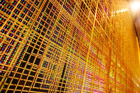 abstract LED display with golden armature in the front