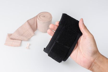 bandage and wrist support isolated on white backgroundの写真素材