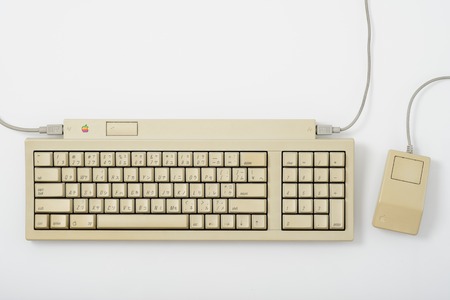 BANGKOK, THAILAND - MAY 05, 2015: The Apple Keyboard II and Apple Desktop Bus Mouse on white...