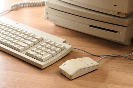 BANGKOK, THAILAND - MAY 06, 2015: Classic Apple Desktop Bus Mouse and classic Apple personal computer.のeditorial素材