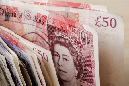 BANGKOK, THAILAND - JULY 13, 2015: Closeup banknotes of the pound sterling.