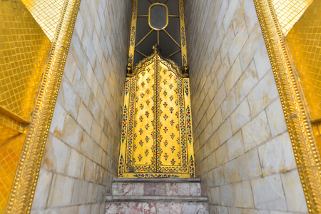 BANGKOK, THAILAND - FEBRUARY 19, 2015: Beautiful of ancient golden entrance of golden pagoda in Wat Phra Kaew in Bangkok, Thailand.のeditorial素材