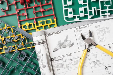 BANGKOK, THAILAND - MAY 17, 2015: Unassembled parts and manual of master grade ver.3.0 RX-78-2...