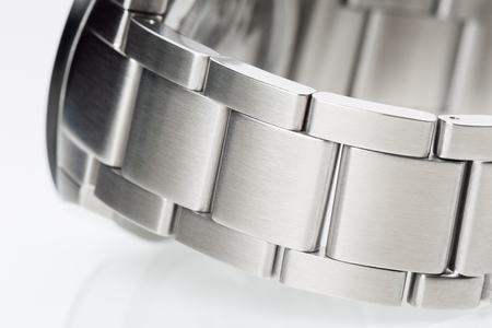 closeup silver metal wrist of men watchの写真素材