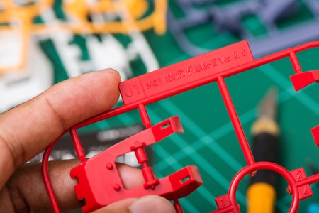 BANGKOK, THAILAND - AUGUST 11, 2015: Closeup letter runner on unassembled sprue of master grade RX-178 Gundam Mk-II Model.のeditorial素材