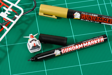 BANGKOK, THAILAND - AUGUST 06, 2015: The Gundam Marker (marker for plastic model kits) on cutting...