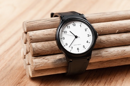 old black plastic fashion wristwatch with scratchの写真素材