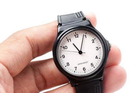 old black plastic fashion wristwatch with scratchの写真素材